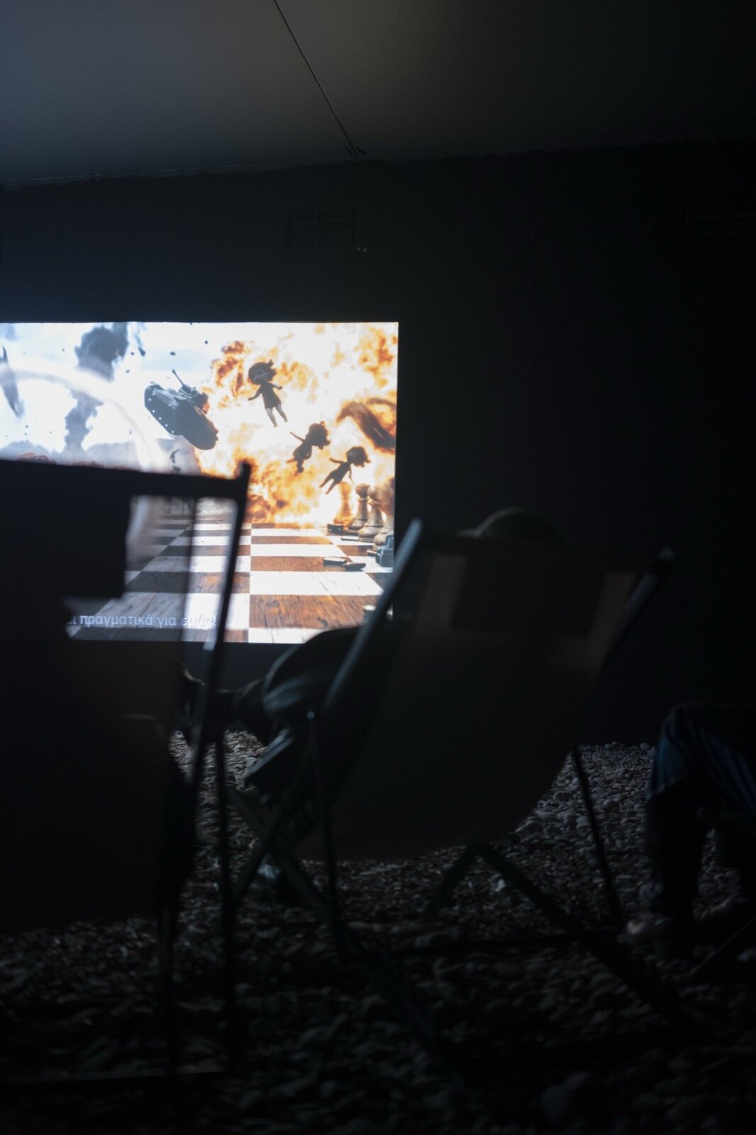 Revolution on screen, viewer in deckchair
